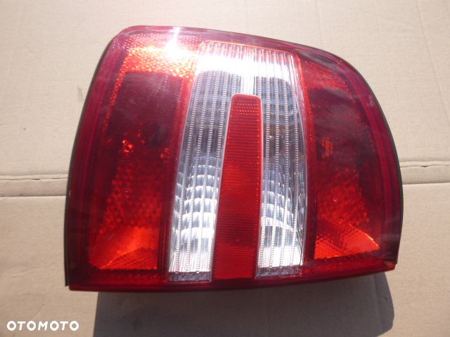 LAMPA LEWY TYŁ LEWA TYLNA SKODA FABIA I KOMBI LIFT 05-08 - 13