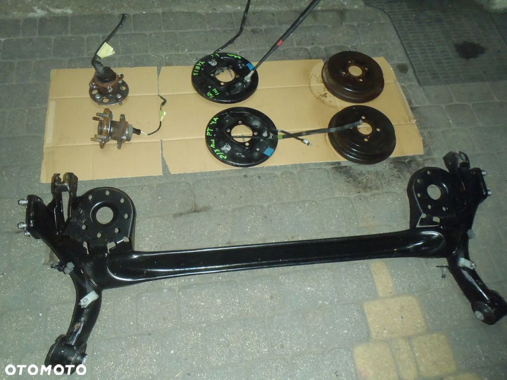 bęben szczęki cylinderek rozpierak hamulec tylny osłona tarcza kotwiczna kostka abs z zawieszenie tył toyota yaris II III 2 3 jak nowe - 7