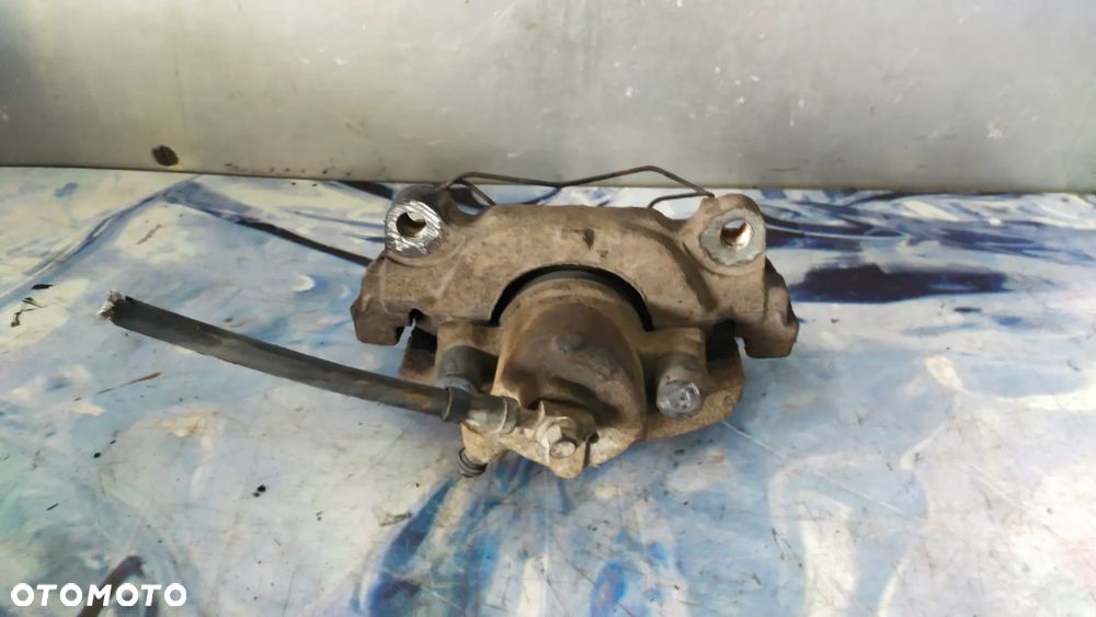 Zacisk hamulcowy PRZOD GOLF PLUS