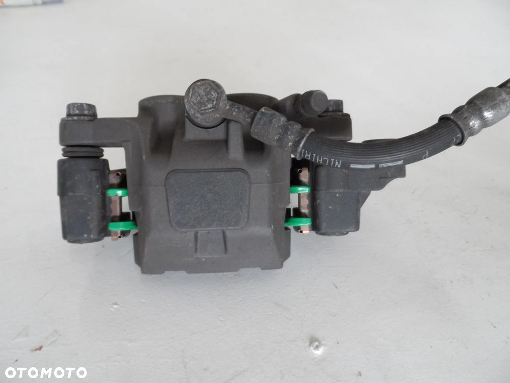 YAMAHA MAJESTY 400 zacisk hamulcowy przedni P, L - 2