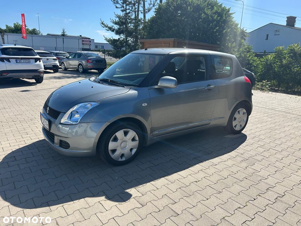 Suzuki Swift 1.3 Club - 12