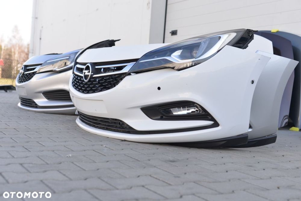 MASKA BŁOTNIK ZDERZAK LAMPA PAS OPEL ASTRA 5 K V - 11