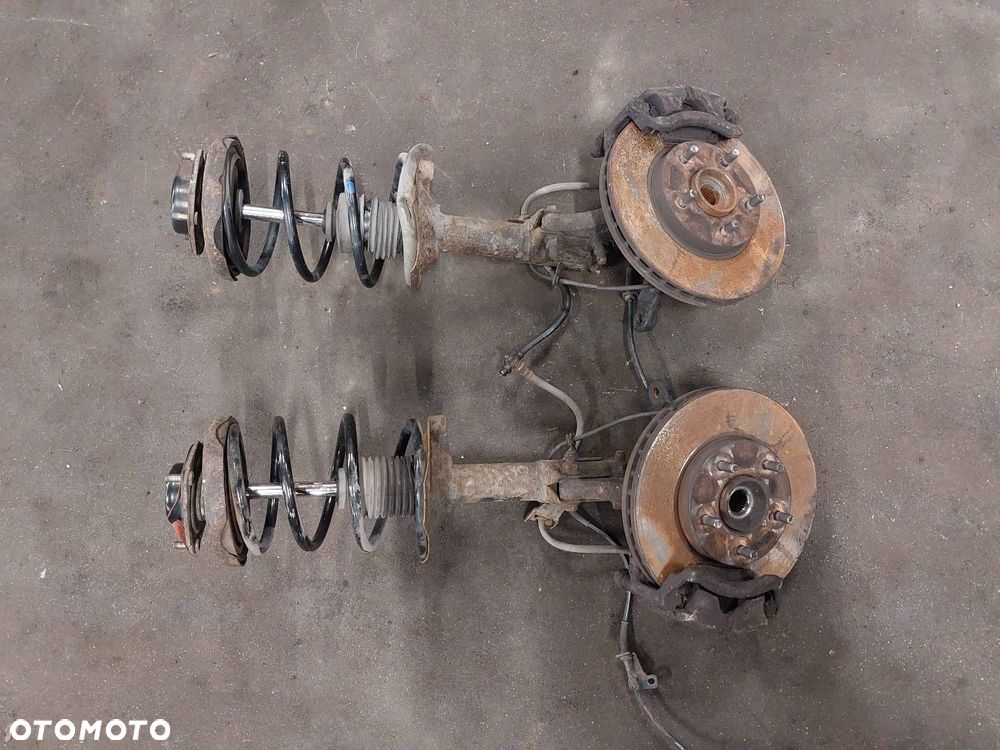 AMORTYZATOR SPRĘŻYNA ZWROTNICA LEWY PRAWY PRZÓD NISSAN ALMERA TINO 2.2 - 1