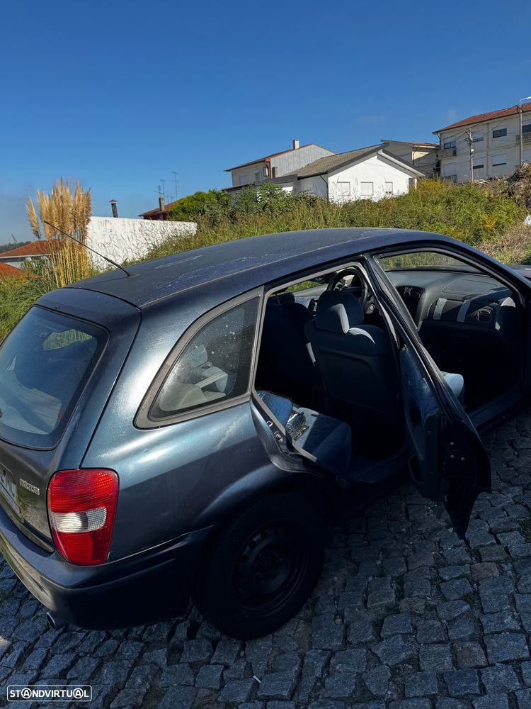 Mazda 323 - 8
