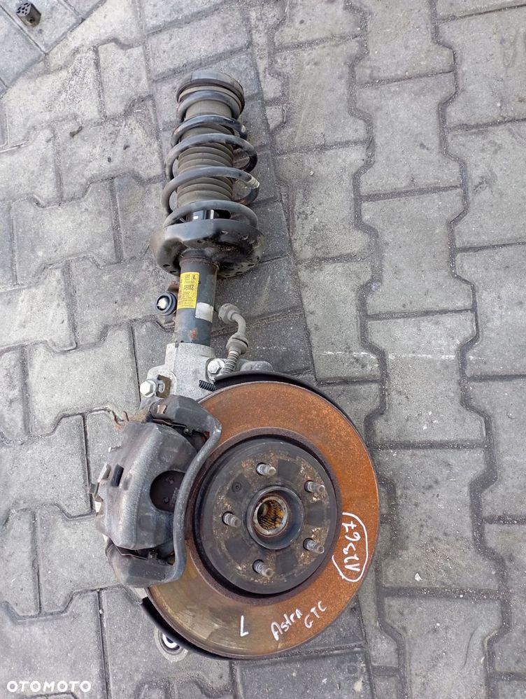 OPEL ASTRA IV J GTC 1.6 SIDI ZWROTNICA LEWA MACPERSON KOPYTO AMORTYZATOR - 1
