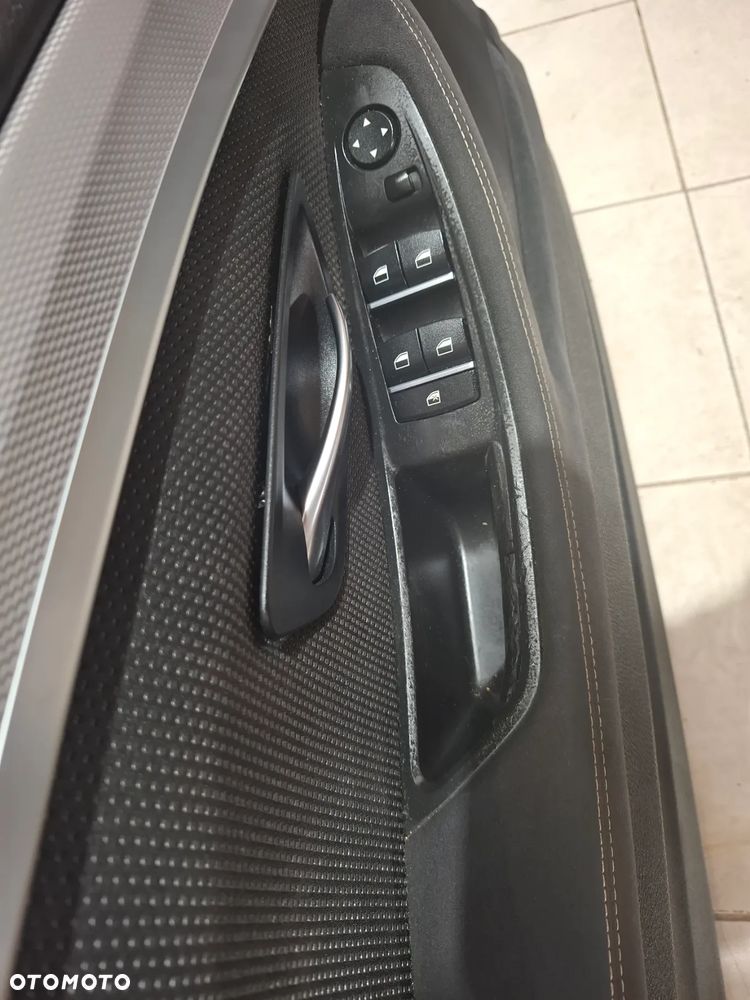 Boczek lewy przód alcantara BMW 5 F10 - F11 rok 2012 - 2