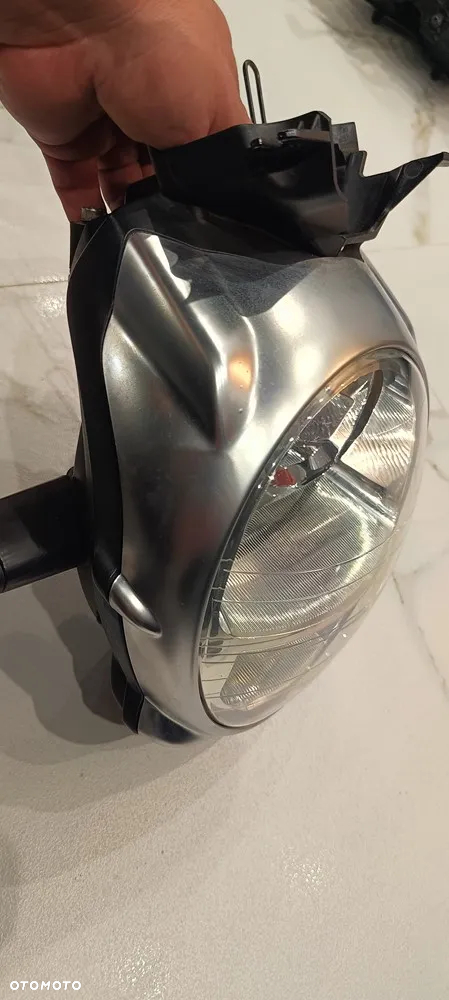 APRILIA MANA 850 REFLEKTOR LAMPA OSŁONA PRZÓD KOMPLET 2008 - 11