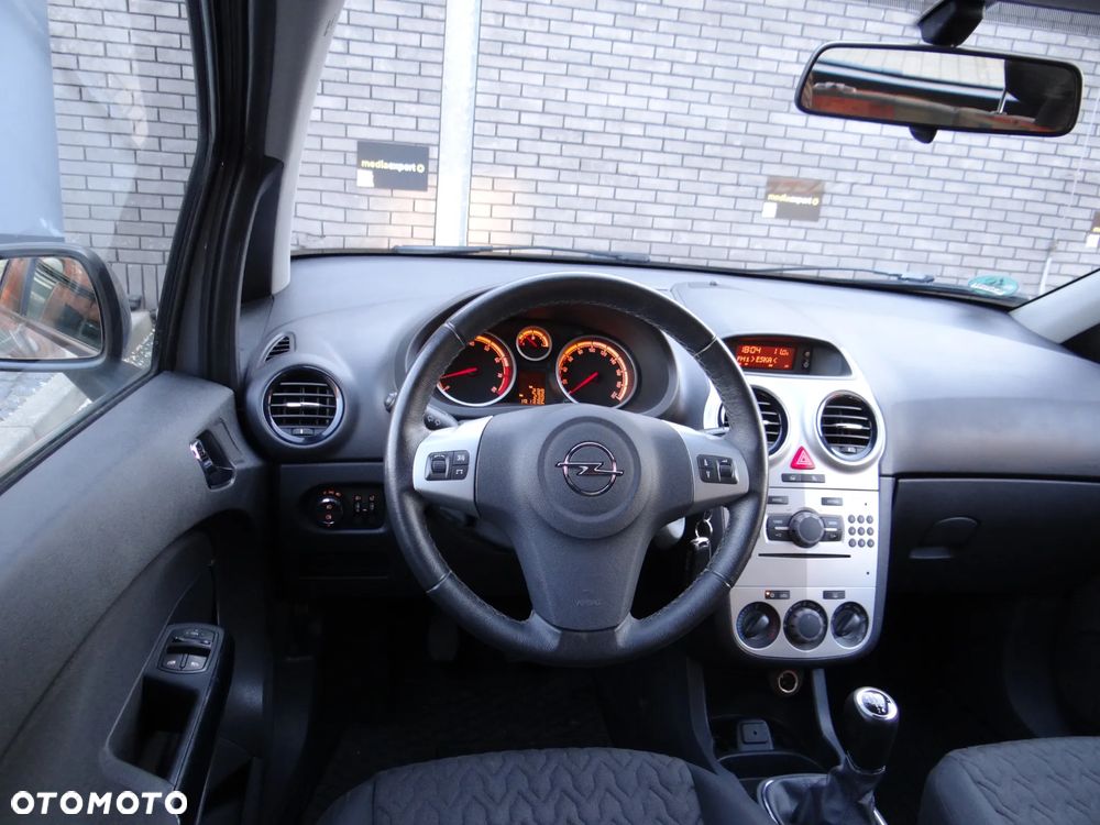 Opel Corsa 1.2 16V Enjoy - 23