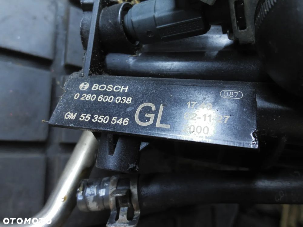 KOLEKTOR SSĄCY 0280600039 OPEL CORSA C 1.0 - 2