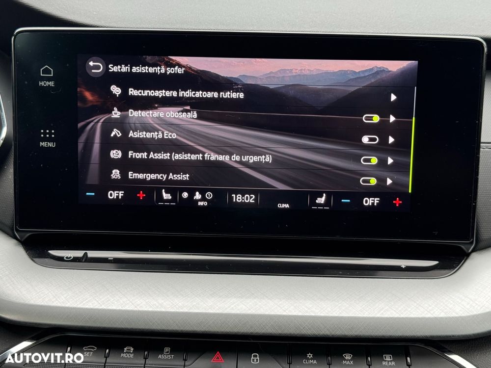 Skoda Octavia 2.0 TDI DSG Tour - 37