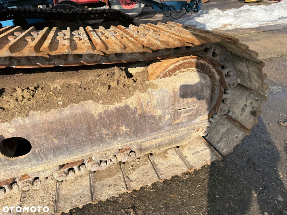 New Holland E215 - 13