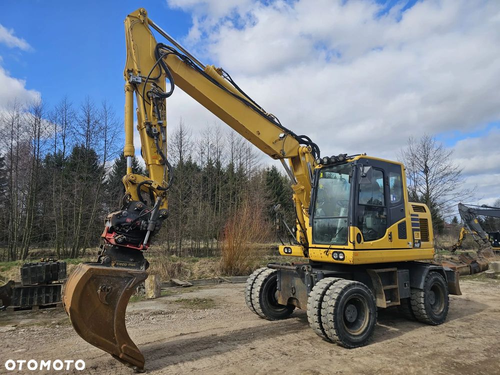 Komatsu PW148-10 - 1