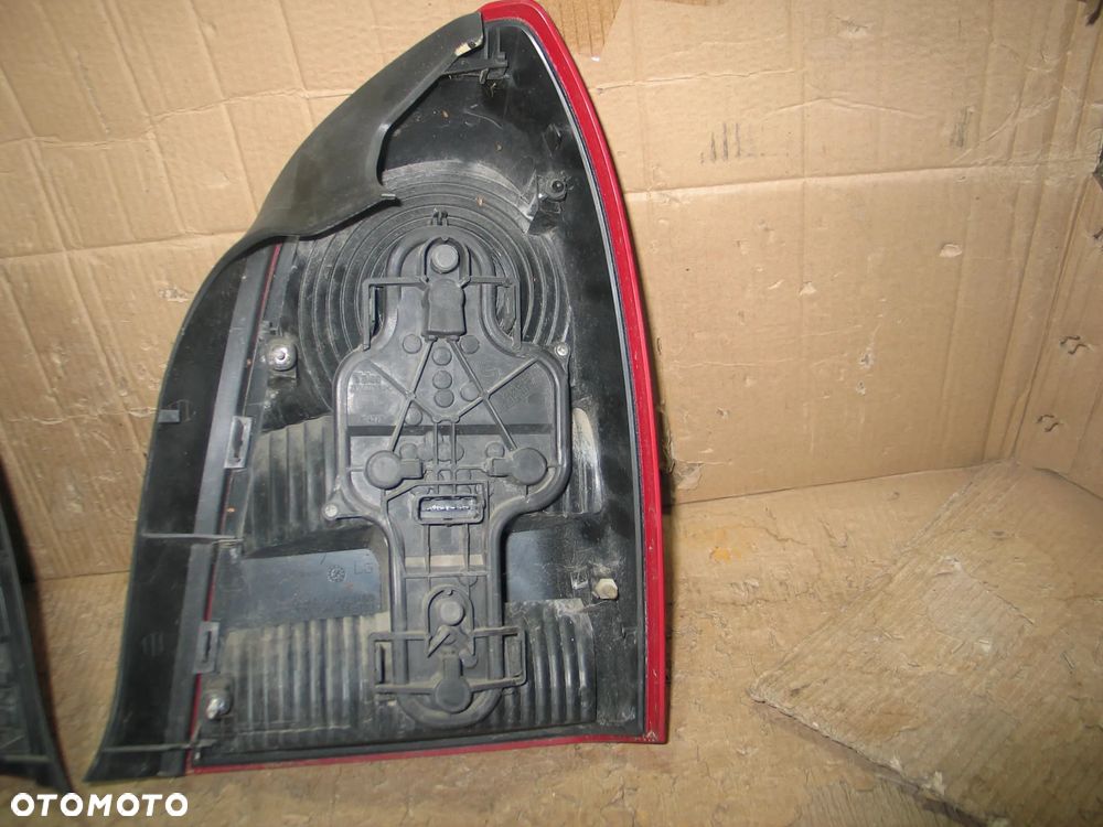 lampa tyl prawa lewa nissan primera P12 sedan oryginal - 12
