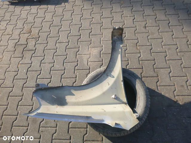 BŁOTNIK LEWY PRZÓD LEWY PRZEDNI CHEVROLET AVEO II T250 07-11 - 13