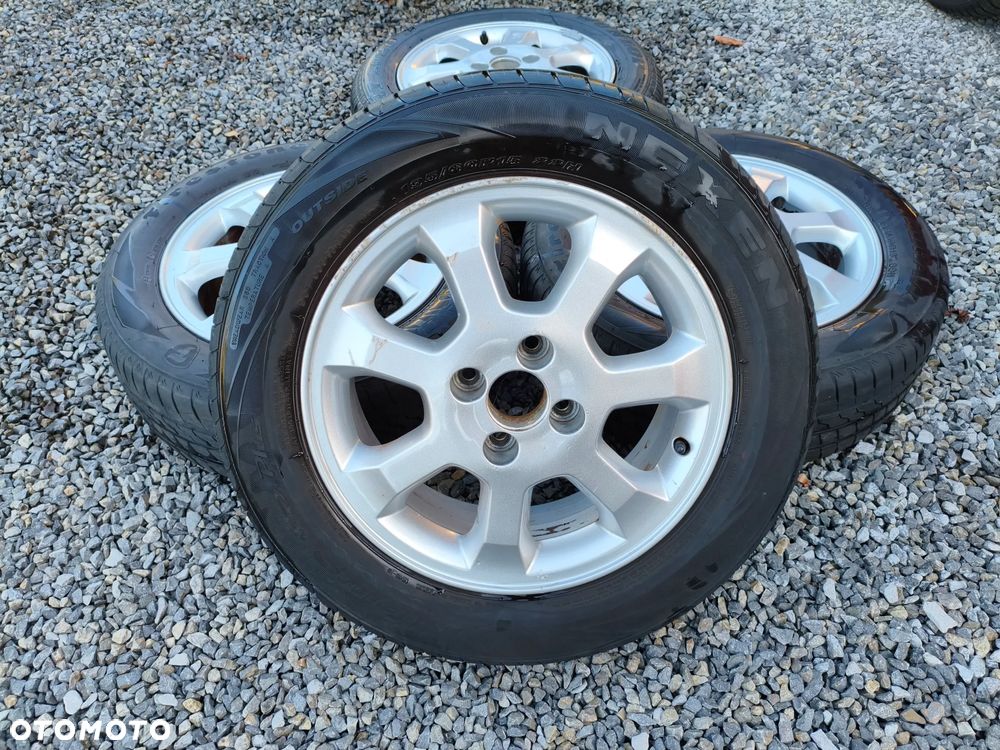 Koła letnie 15 4x100 Opel Astra - 1