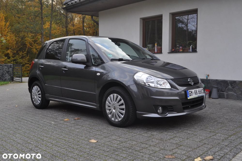 Suzuki SX4 1.6 Comfort Plus - 13