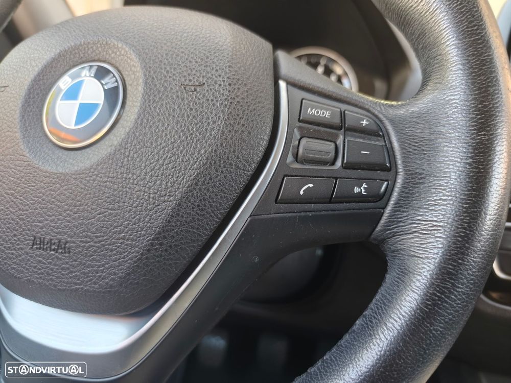 BMW 116 i Advantage — fotografia 23