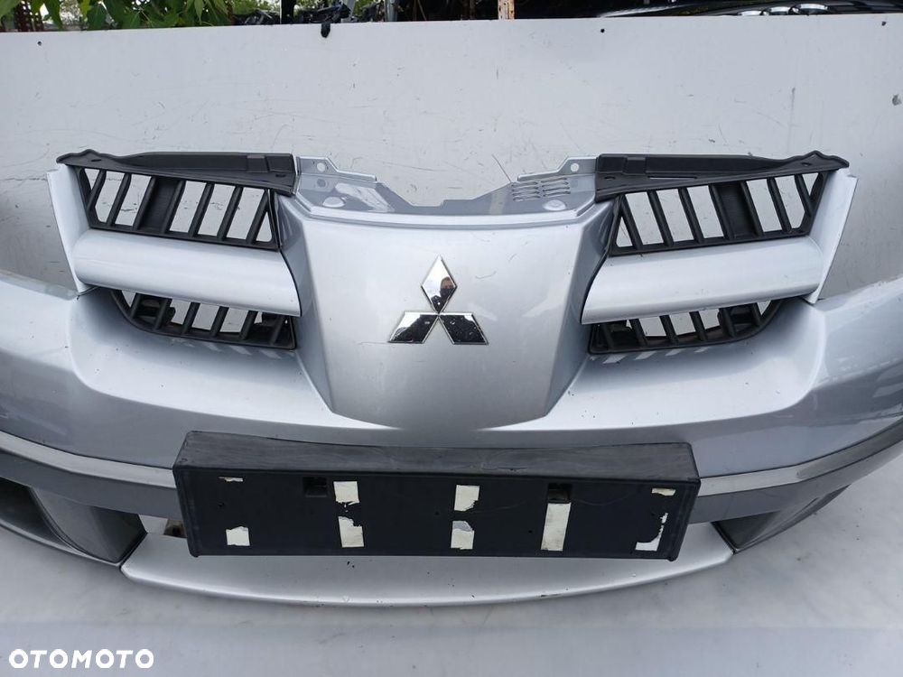 ZDERZAK PRZÓD PRZEDNI ATRAPA Z HALOGENAMI MITSUBISHI OUTLANDER I 4N175839 - 4
