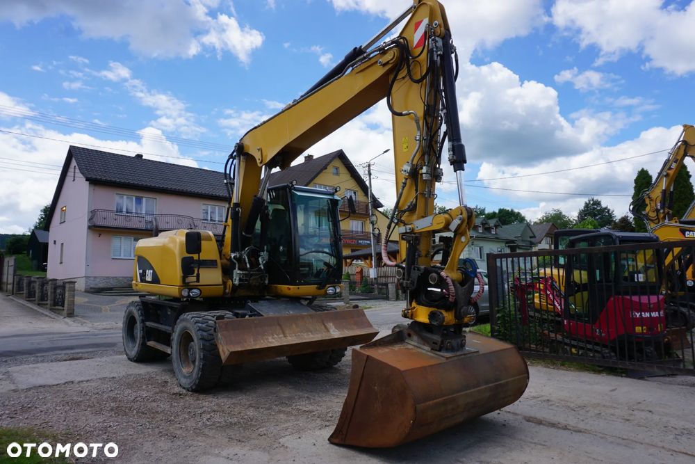 Caterpillar CAT M 313 D - 1
