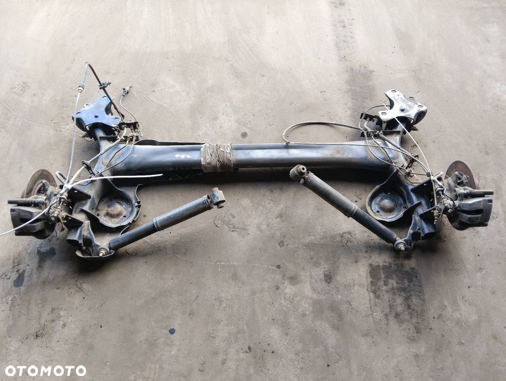 BELKA OŚ ZAWIESZENIA TYŁ TARCZE Z ABS RENAULT MEGANE III HB 5D - 1