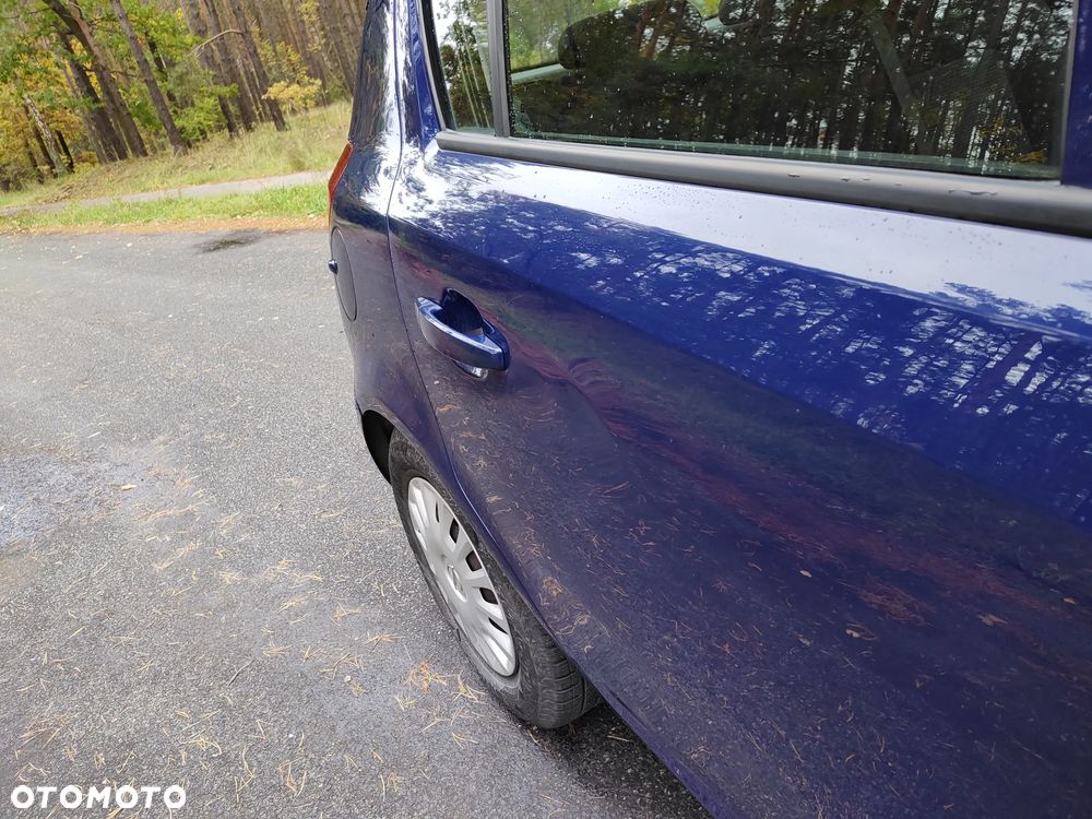 Opel Corsa 1.2 16V Essentia - 9