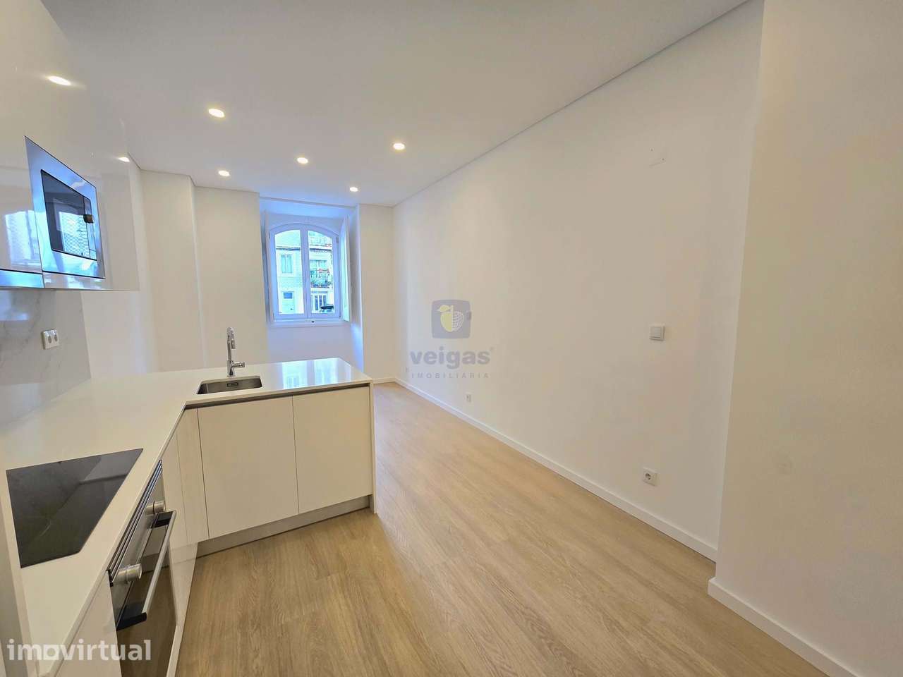 Apartamento T2 com terraço com duas frentes ao nível do RC no empreend - Grande imagem: 2/20