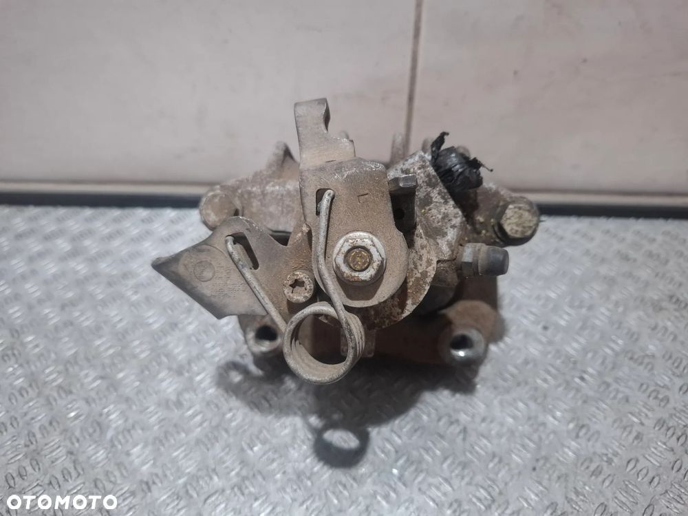 Zacisk hamulcowy lewy tył Volkswagen Seat Skoda - 2