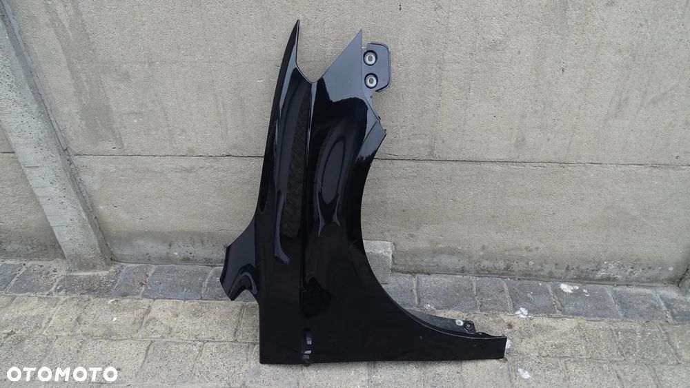 VW CADDY 2K5 15r> - błotnik przedni prawy - 1