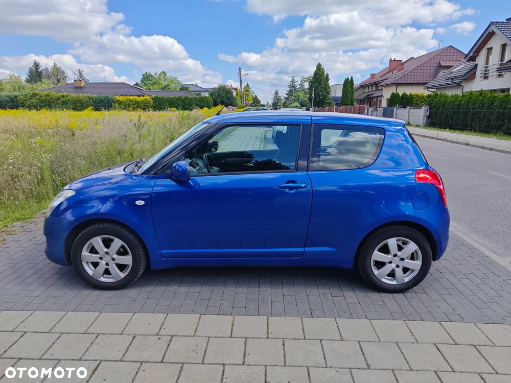 Suzuki Swift 1.3 Club - 4