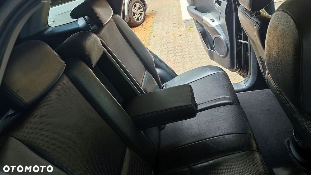 Kia Sportage 2.0 Freedom + - 18