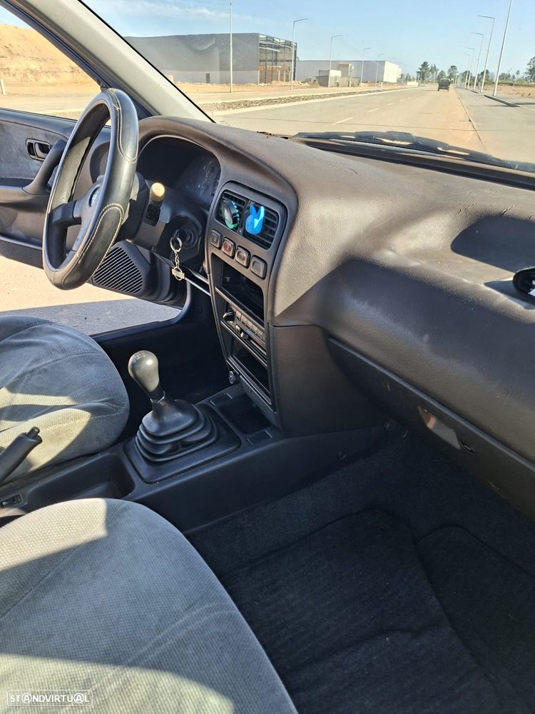 Nissan Primera Hatchback 1.6 LX + - 10