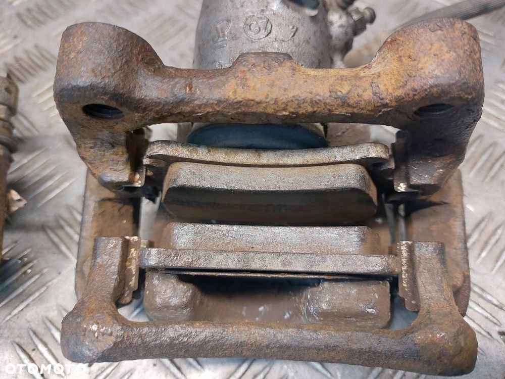 TARCZE HAMULCOWE TYŁ + KLOCKI + ZACISKI  VOLKSWAGEN TOURAN I 254MM - 7