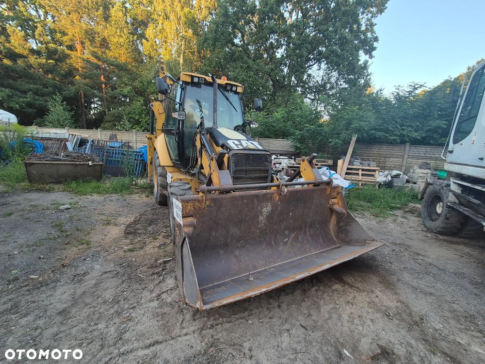 Caterpillar 428 E - 11