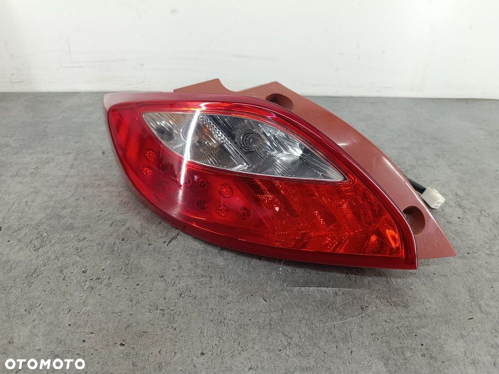 LAMPA TYLNA LEWA MAZDA 2 II D65151160  P5776L STANLEY   HATCHBACK 5D - 1