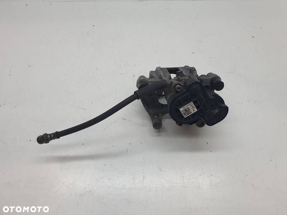 ZACISK HAMULCOWY TYŁ TYLNY PRAWY JARZMO SKODA OCTAVIA IV LIFT 2.0 TDI - 2