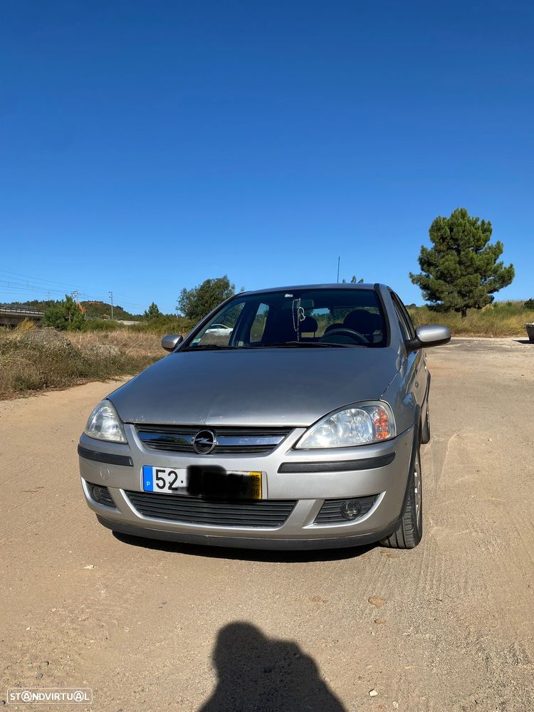 Opel Corsa 1.2 Twinport Cosmo - 1