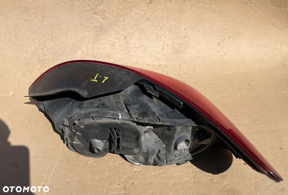 Lampa VW Scirocco III  lewa 1K8945095H - 3