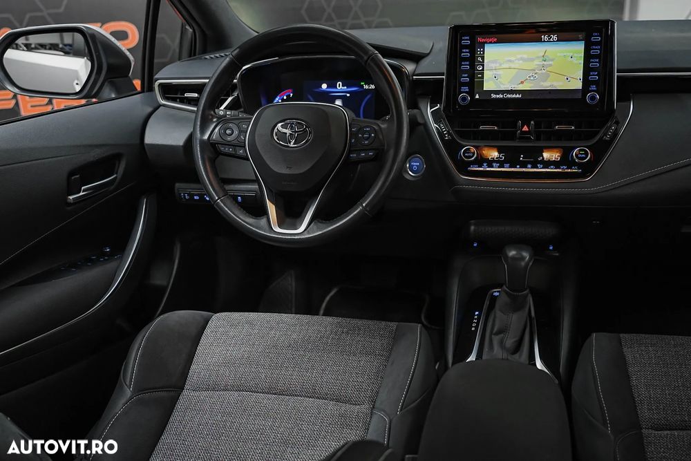 Toyota Corolla 1.8 HSD Business - 8