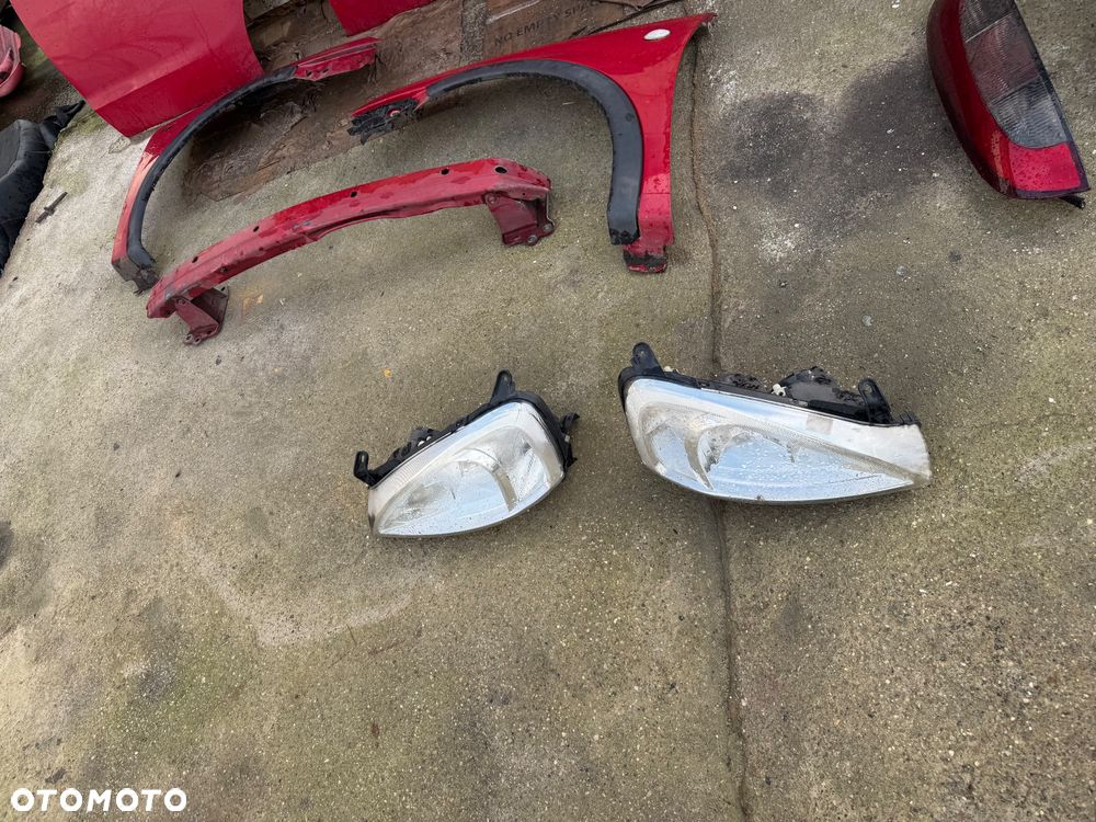 Opel Corsa c czerwone bordowe drzwi przednie przód prawe lewe maska lampy przód przednie lampy tył tylnie maska błotnik prawy lewe lampy tył belka przód - 10