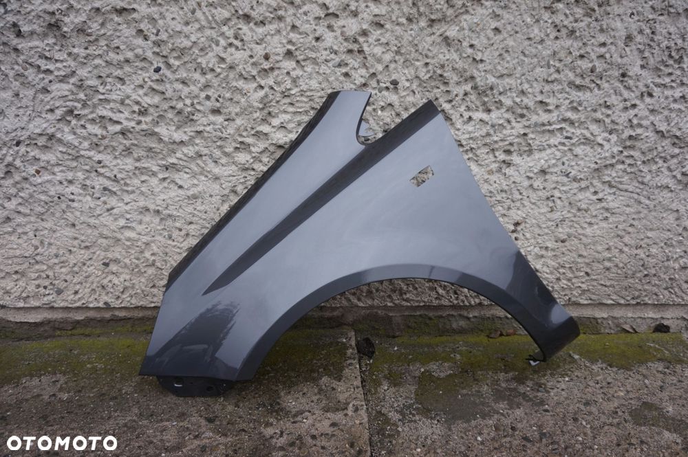BŁOTNIK PRZEDNI LEWY OPEL CORSA D Z177 - 1