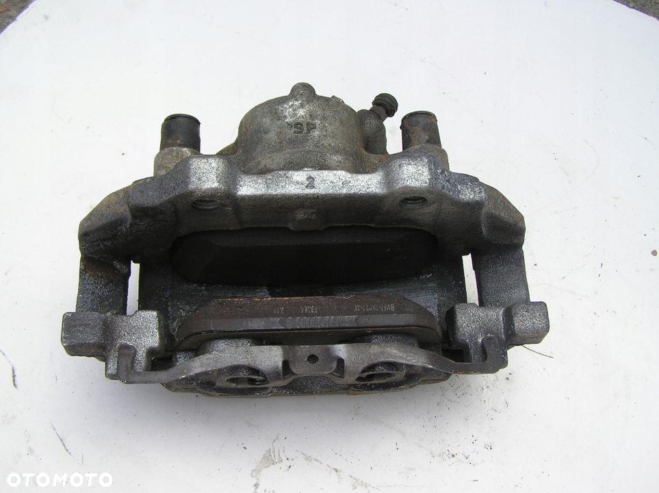 FORD TRANST CONNECT MK2 1.5 ZACISK PRZÓD Prawy 17r - 2