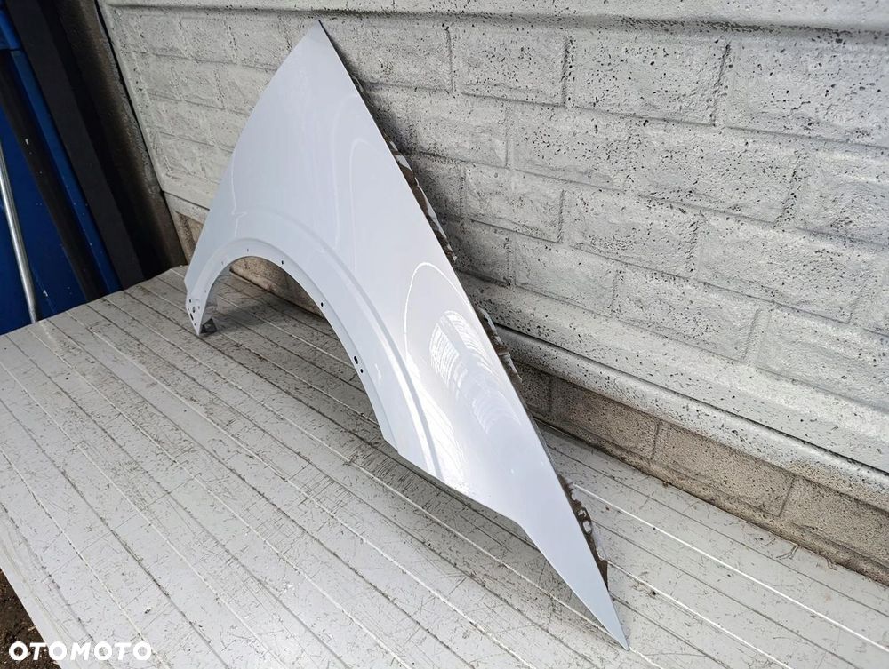 POLESTAR 2 BŁOTNIK PRZEDNI PRAWY ORYGINAŁ - 2