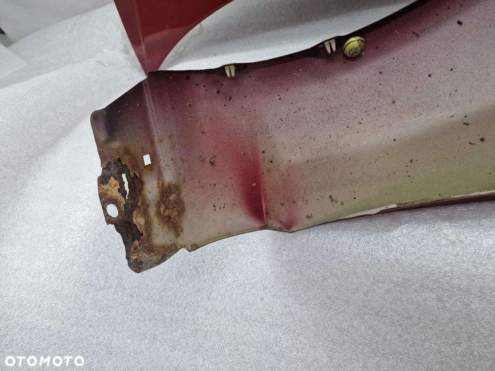 DAEWOO LACETTI 02- LEWY / PRAWY BŁOTNIK , KOLOR BORDO METALIK , NR AUKCJI NM124 - 26