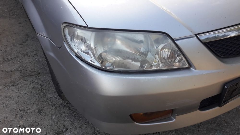 Mazda 323 323f BJ 98-03 Lift  Maska lampa zderzak pas atrapa 22V - 6