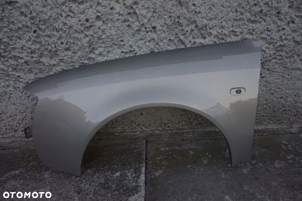 BŁOTNIK PRZEDNI LEWY AUDI A6 C5 LY1T 97/01r