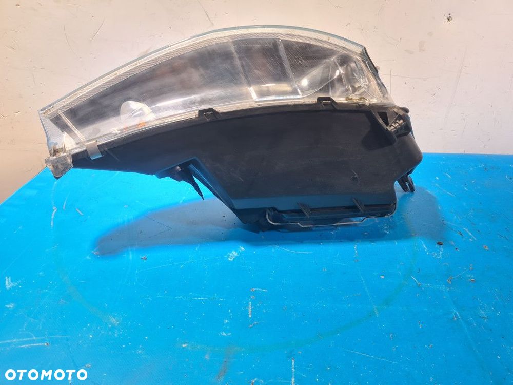 REFLEKTOR LEWY FORD FOCUS MK1 - 9