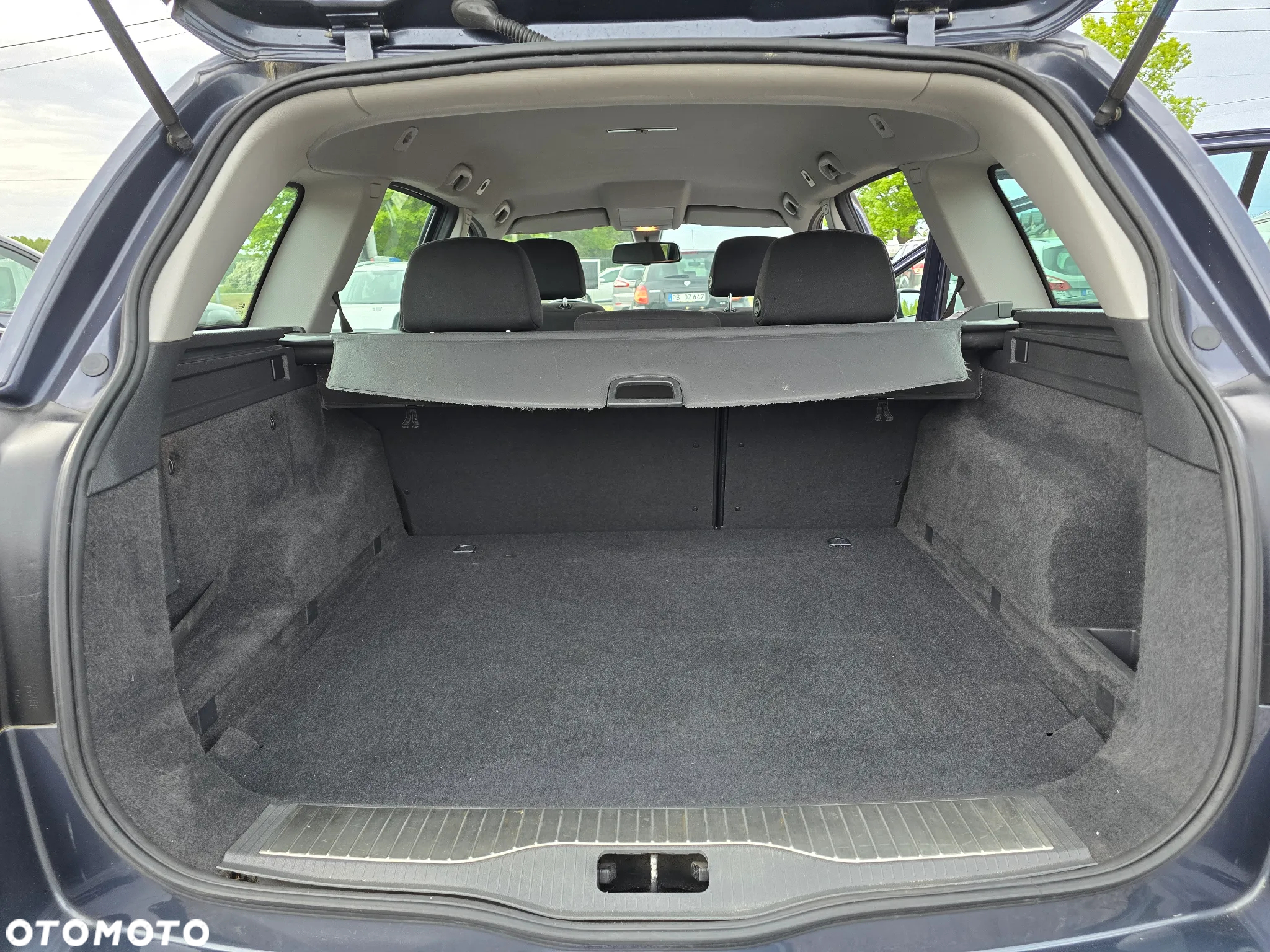 Opel Astra 1.6 Caravan Sport - 36