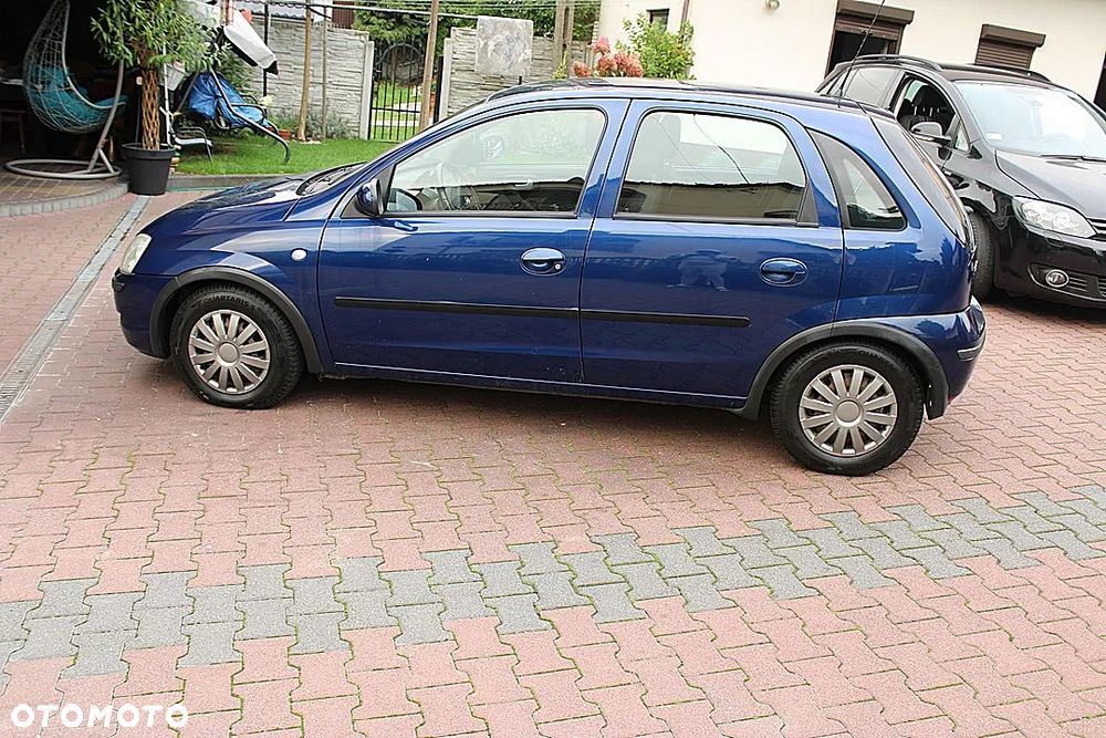 Opel Corsa 1.2 16V Cosmo - 8