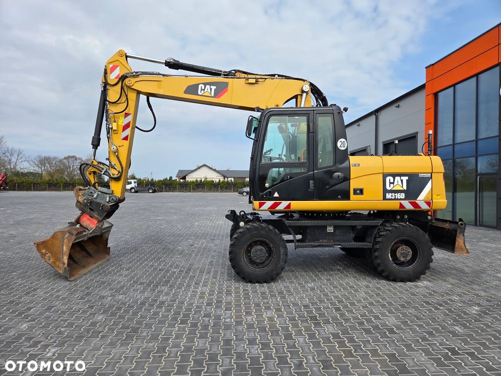 Caterpillar M 316 D / z Niemiec / Tylko 7500 mth / Instalacja pod System 3D Trimble / / - 2