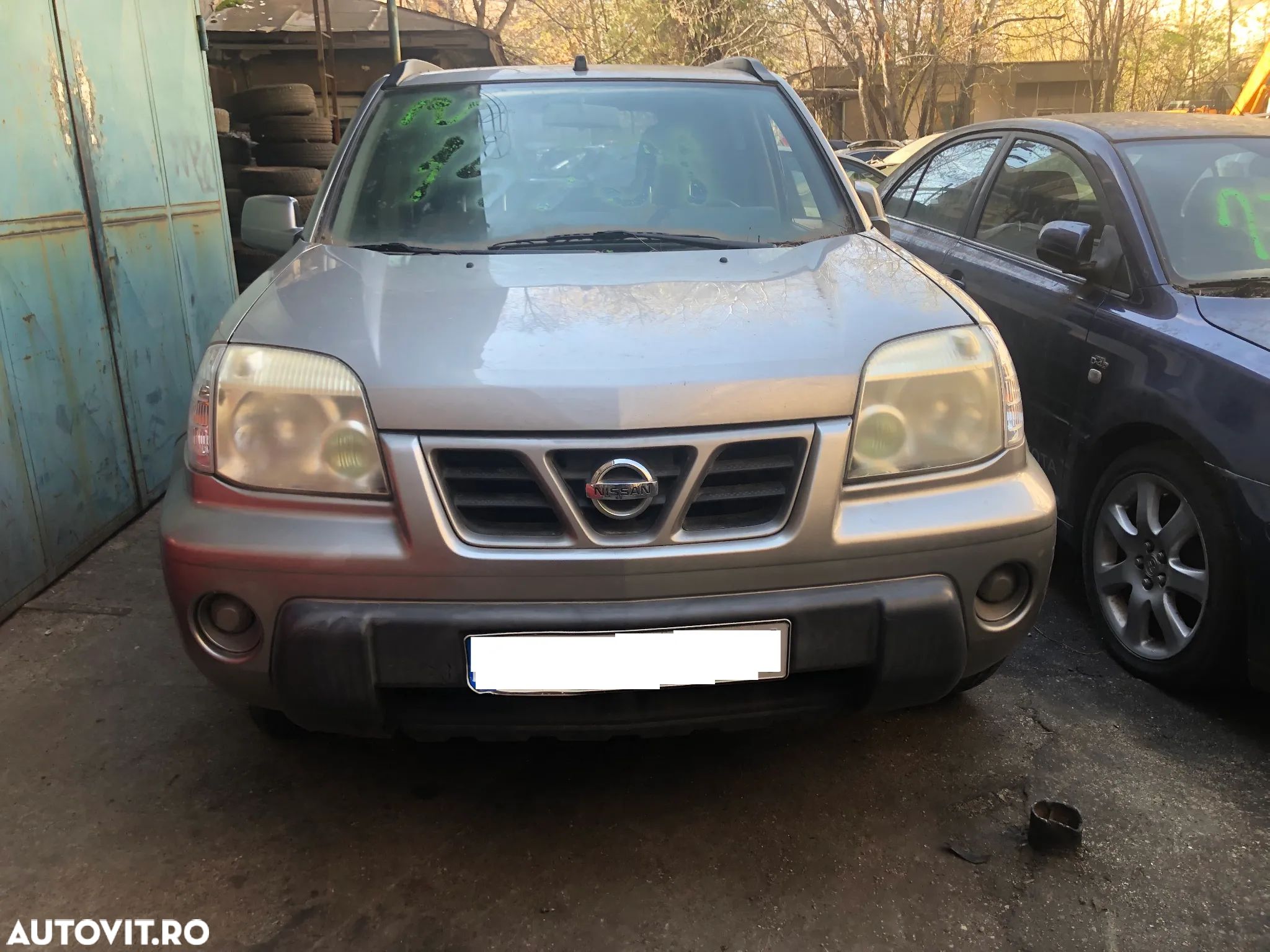 Far stanga/Far dreapta fata halogen Nissan X trail 2003 - 1